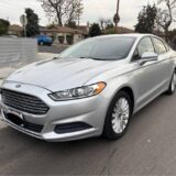 2014 Ford Fusion Hybrid Limited for $0 Build Credit, Poor