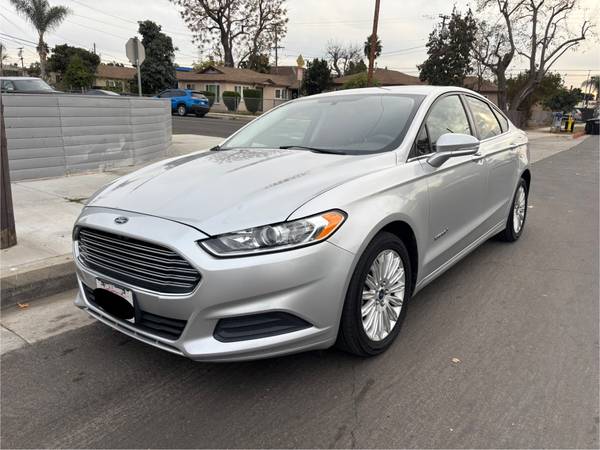 2014 Ford Fusion Hybrid Limited for $0 Build Credit, Poor