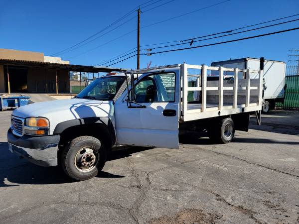 2002 GMC Sierra 3500 Lift Gate Stake Bed for $0