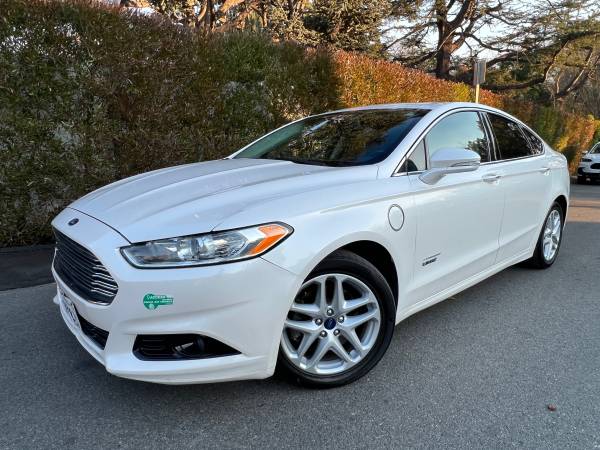 2016 Ford Fusion Energi Titanium for $0 Build Credit, Poor