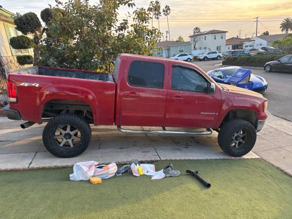 2023 GMC Sierra Red Lifted Trim for $0 Build Credit,