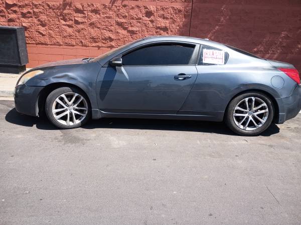2010 Nissan Altima, 2007 Toyota Scion, 2005 Ford Mustang Convertible