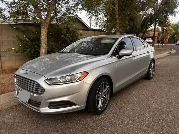 2014 Ford Fusion Titanium with Premium 20" Rims for $0