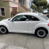 2014 Volkswagen Beetle White (64,014 mi.) for $0 Build Credit,