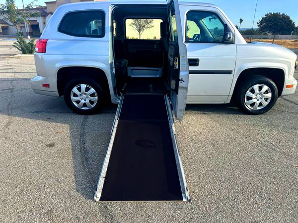 2023 HUMMER Electric RAMP Wheelchair Mobility Van for $0 Build